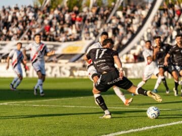 action packed football match with crowds