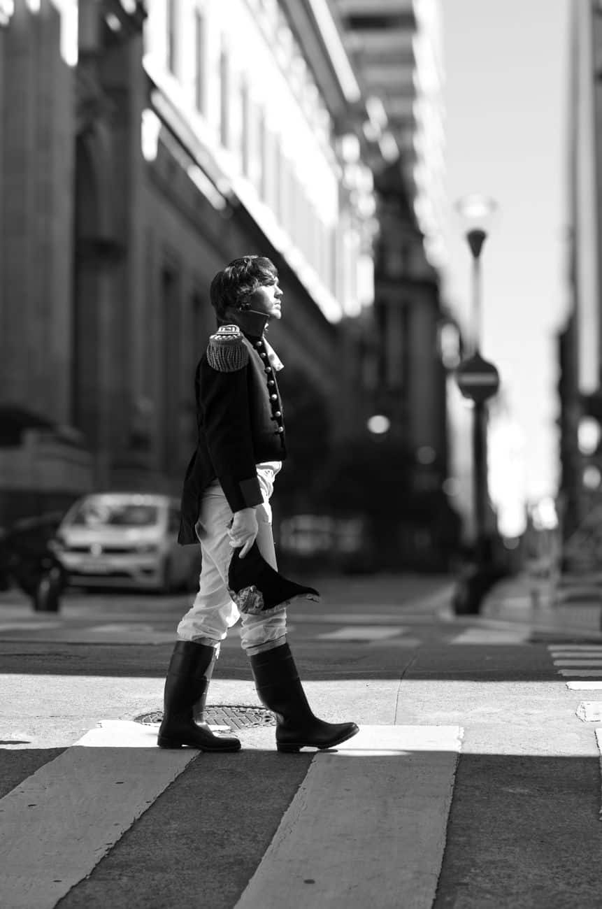 historical reenactor walks along buenos aires street